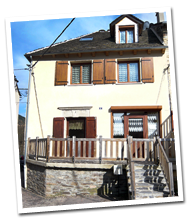 Extérieur de l'appartement avec terrasse fermée